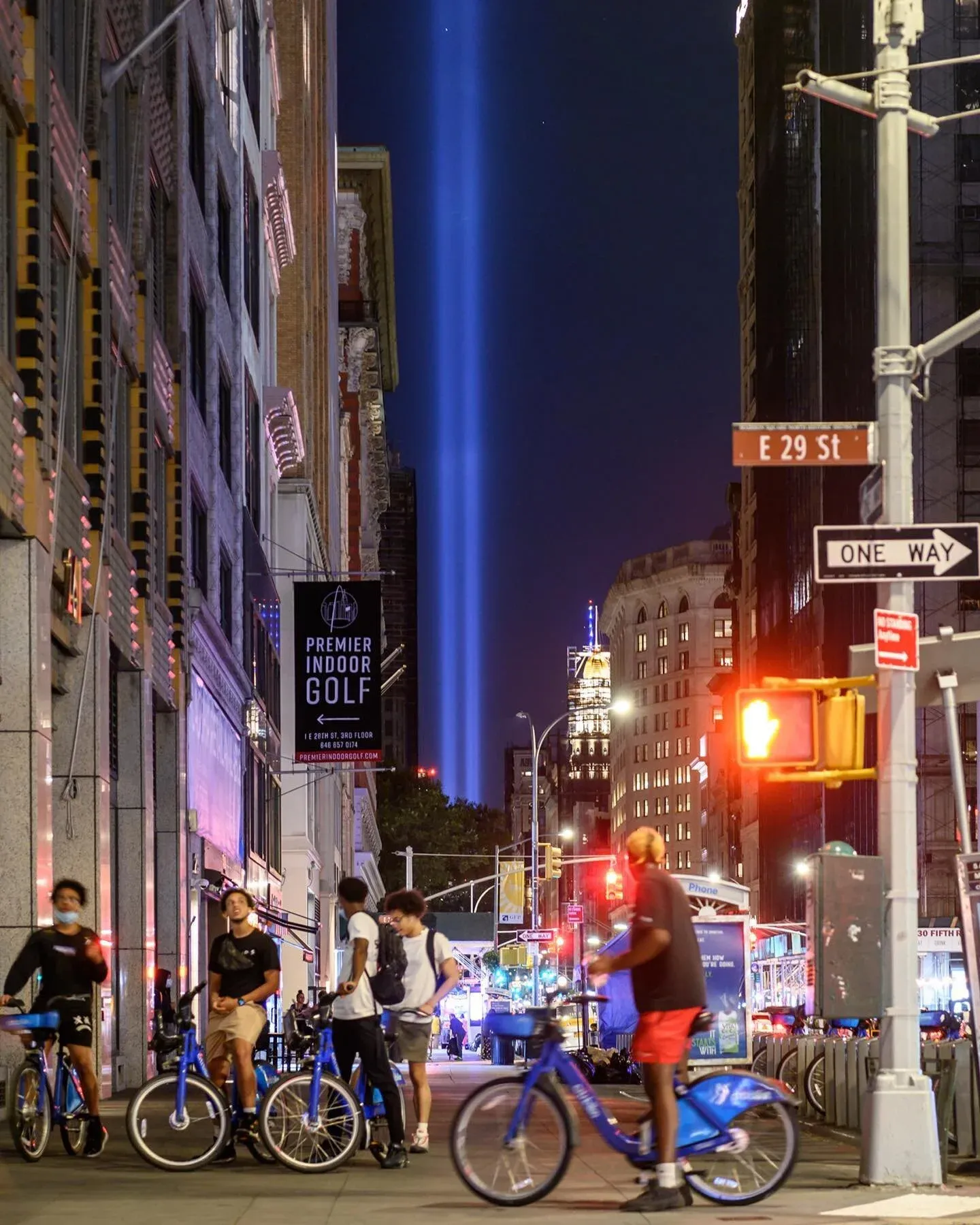 Took a different approach to capturing the Tribute in Light this year. I sought out non-standard perspectives showing the lights beaming above a lively city (despite what you may have read, NYC is very much alive). Seeing the lights, both up close an